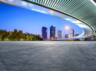 Panoramic skyline and modern commercial office buildings with empty road. Asphalt road and cityscape. © ABCDstock