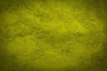 Yellow and orange background texture with distressed vintage grunge and shiny spotlight corner design.