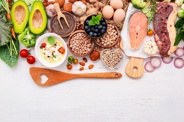 Ketogenic low carbs diet concept. Ingredients for healthy foods selection set up on white wooden background.