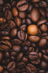 Roasted coffee beans full frame background Close up macro dark brown