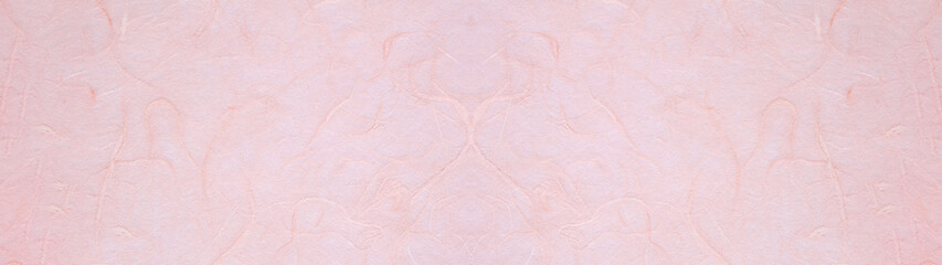 桃色の手漉き和紙の表面のテクスチャー。横に長いパノラマの背景素材。