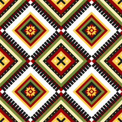Fabric pattern vintage style. Raster geometric seamless pattern withsquares, rhombuses, triangles..Tribal motif. red, green and yellow andgray color.