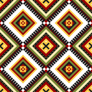 Fabric pattern vintage style. Raster geometric seamless pattern withsquares, rhombuses, triangles..Tribal motif. red, green and yellow andgray color.