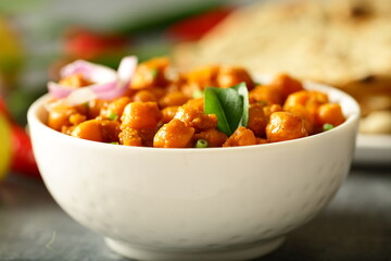 Bowl of chickpeas curry, chana, masala, Indian traditional vegetarian recipes.