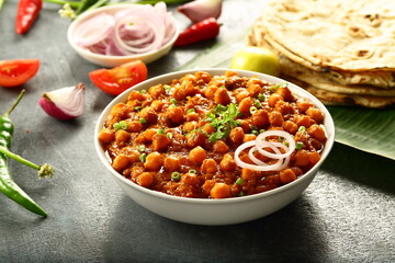 Homemade delicious  wholesome vegetarian diet meal- chana masala, chickpea curry served with whet...
