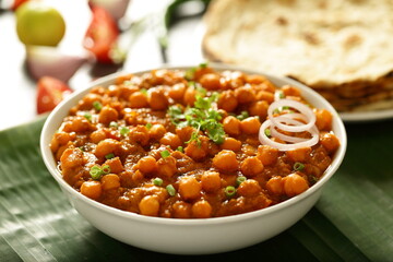North Indian cuisine- Homemade delicious  organic chickpeas curry roast, chana masala. Punjabi dhaba style cooking.