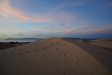 Fototapeta na wymiar sand dunes at sunset