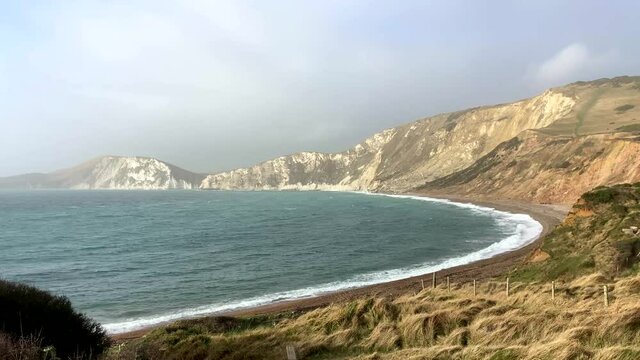Beautiful shot of an empty beach and cove on the Jurassic Coast in Dorset, England