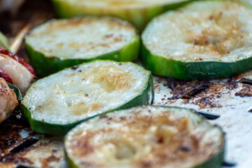 Chicken breast and pork meat pulled in wooden skewer with fresh colorful and tasty vegetables