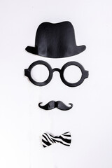 Black hat round eyewear spectacle frame moustache blue neck bow tie face shape paper die cut selfie portrait party fun paper prop sticker stick on white background