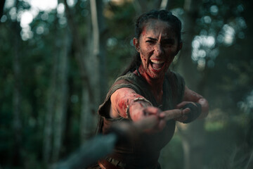 Aggressive woman attacking with spear and shield
