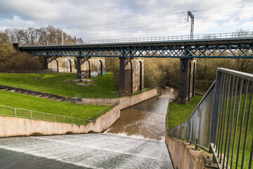 Water flowing down Carr Mill Dam