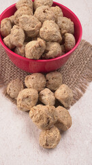 Raw soya chunks on dark background. Healthy, nutritious soybean meat, chunks isolated.Vegan food concept.
