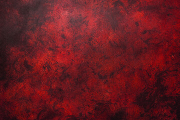 Red weathered wall textured background with garnet tones. Aged wall.