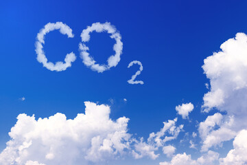 Blue sky with word CO2 . Global warming concept. Natural disasters and cataclysms - obrazy, fototapety, plakaty