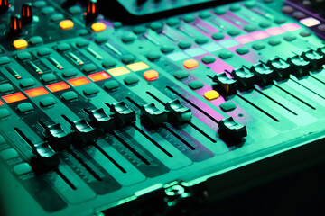 Closeup of an audio mixing control panel