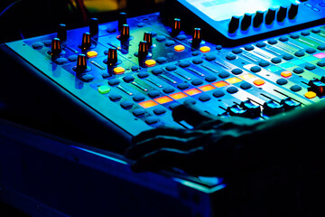 Closeup of an audio mixing control panel
