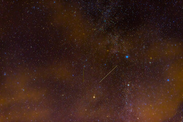 Stars on the background of the night starry sky with many constellations, universes and shooting...