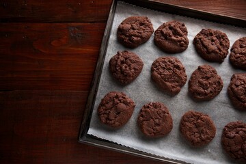 Triple chocolate chip cookies on a baking sheet