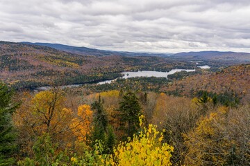 View on the Assomption lake and the Laurentides mountains from the Belvedere at the end of "Grandes Vallees" hiking trail in Mont Tremblant National Park, in Quebec, Canada