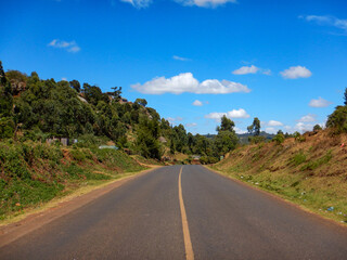 Fototapeta na wymiar Scenic view of an empty highway against trees in Iten, Rift Valley, Kenya
