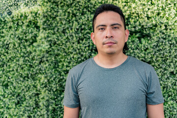 portrait of young Aboriginal Colombian man outdoors