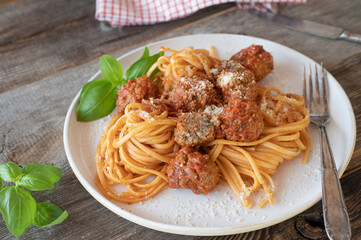 Traditional italian dish with Spaghetti with meatballs and tomato sauce