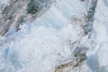 Obraz premium Melting river ice. Columnar and needle-like structure of crystals. Ice floe in the spring on the banks of the Amur River.