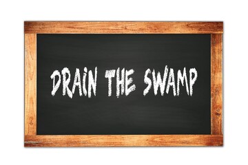 DRAIN  THE  SWAMP text written on wooden frame school blackboard.