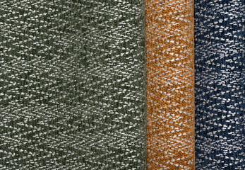 Colorful decorative fabrics arranged in tubes