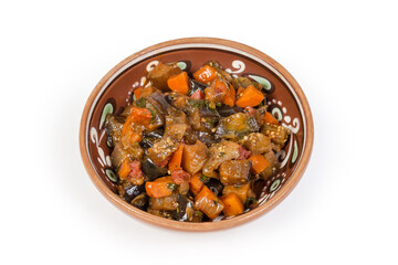 Chopped eggplants stewed with other vegetables in clay bowl
