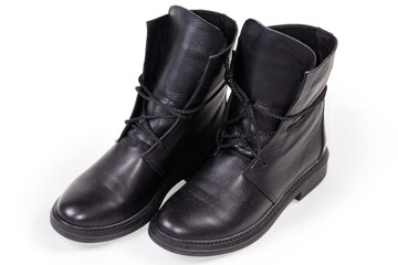 Black leather women's boots on a white background