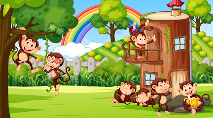 Obraz na płótnie Canvas Outdoor scene with tree house and many monkeys