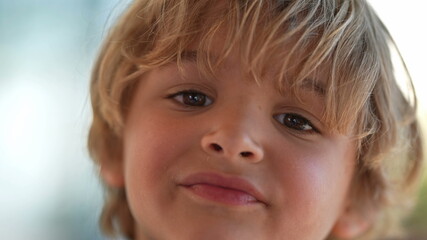 Portrait blond child boy close-up face