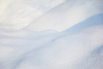 Winter snow background. Snowy white texture. Snowflakes.