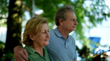 older couple walking together, senior people relationship outside in day walk