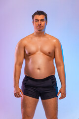 A very fat man want to lose weight and become a slim athlete. Fitness concept.