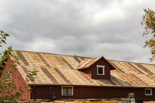 Warehouse with corrugated iron roof sheets, Temecula city, California - Powered by Adobe