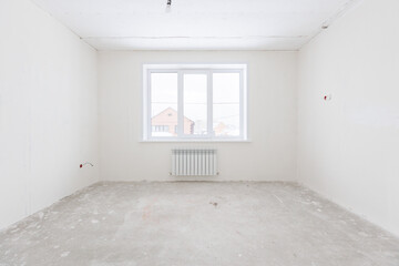 interior of the apartment without decoration in gray colors