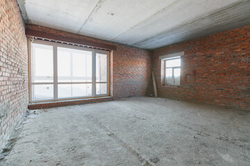 interior of the apartment without decoration in gray colors