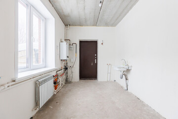 interior of the apartment without decoration in gray colors