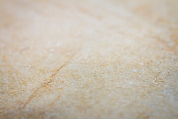 Extreme closeup of biege handmade paper