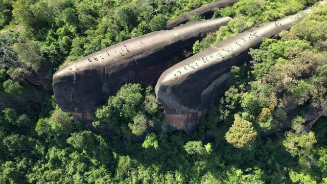 Zoom Out Bird Eye View of Three Whale Rock in Beung Kan Thailand