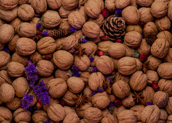 Still life of walnuts and flowers, top view