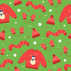 Seamless pattern of red winter hat, mittens, scarf and sweater. Winter elements on green background. Doodle style. 