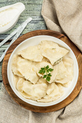Dumplings with cottage cheese and sour cream