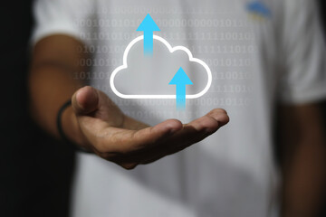 Business women are holding the clound technology used to store data around the world.