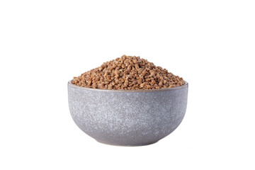 raw buckwheat in bowl on white background isolated