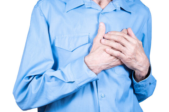 Eldery Man Suffering From Heartache. Male Hands Holding Heart.  Isolated On White Background.