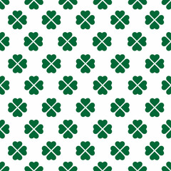 St Patrick Day. Seamless pattern with little four leaf clovers. Clover sign symbol pattern. Simple Repeatable design with Green clover on a White Background. Good luck symbol of Ireland